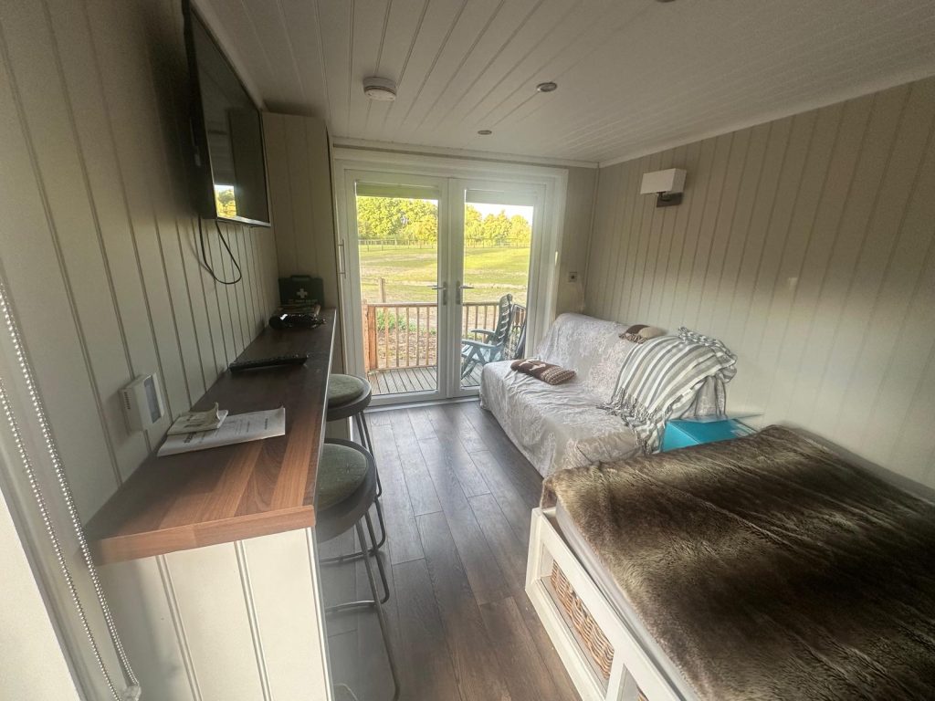Warm and inviting living room at the retreat farm, designed for relaxation and comfort.