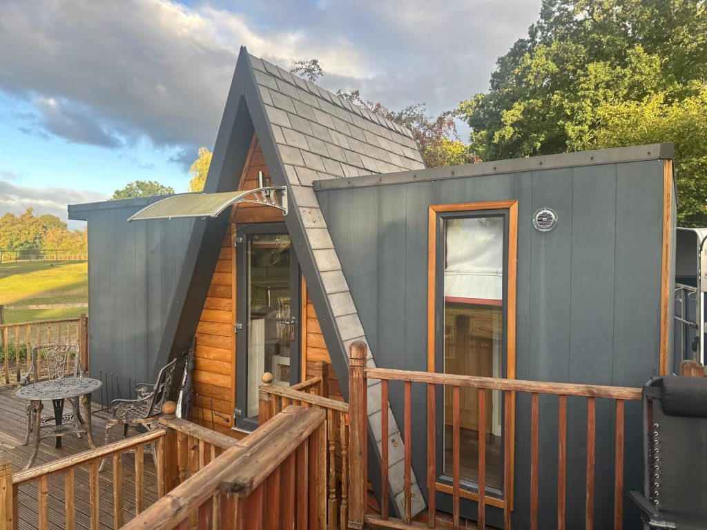 Wide view of the alpaca farm retreat surrounded by nature, offering a peaceful and restorative environment.